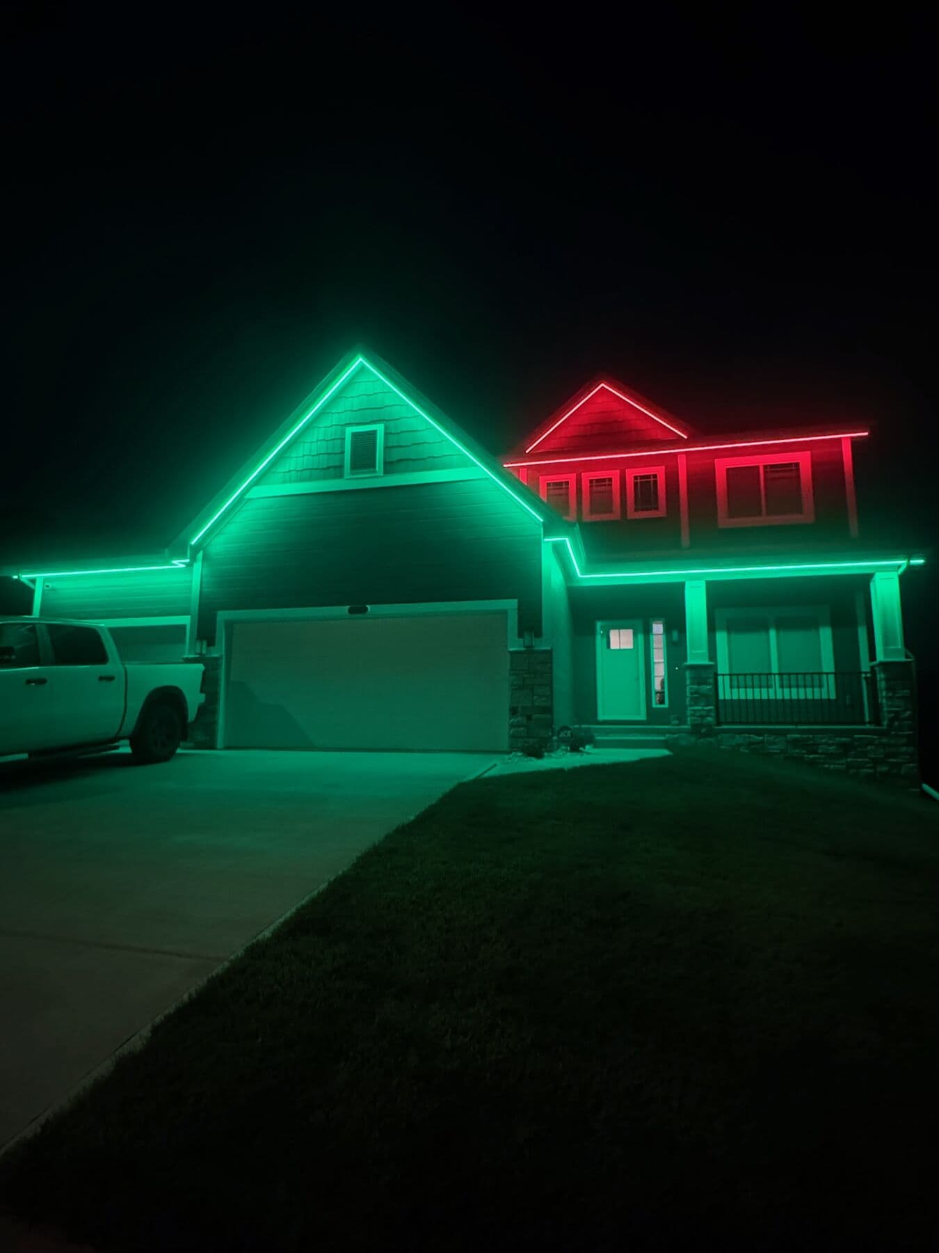 An Omaha two-story with the main elevation in green and the upper gable in red