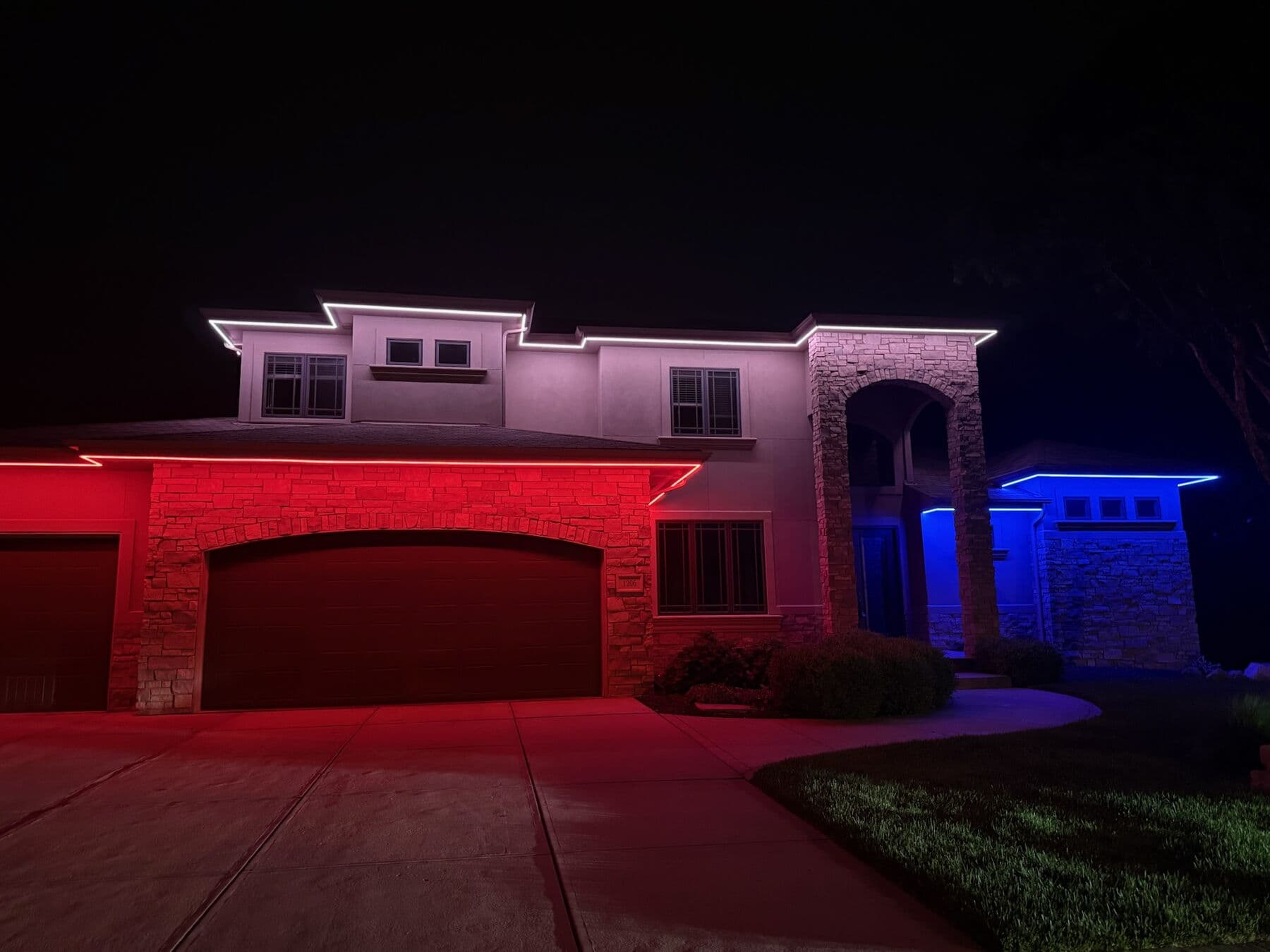An Omaha two-story with the left half of the elevation in red and the right half in blue